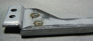 Fig23-DSCN3906 Figura 23 – Soldas ponto na parte superior do braço.