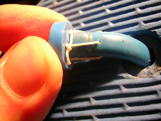 Figura 6 – Tira pronta, onde se vê o nó da cordinha, que ficará escondido.