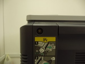 Figura 7 – Retirada de parafuso do painel posterior I.