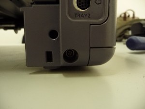 Figura 9 – Retirada de parafuso do painel posterior III.