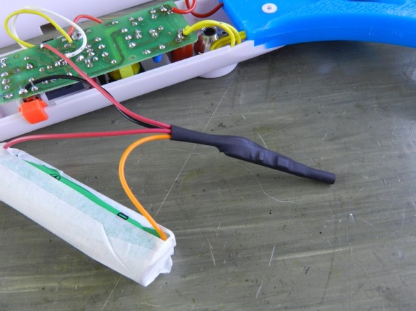 Fig. 11 – Espaguete encolhido após aplicação de calor.